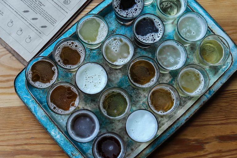 different types of beer in a tray