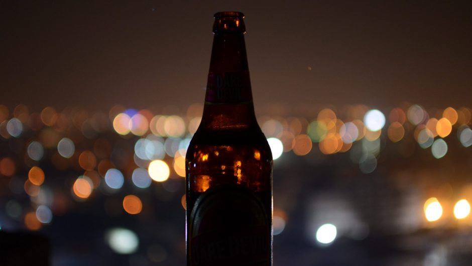 beer with city light background