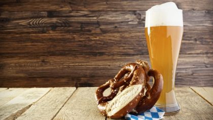 Beer / Helles Hefeweizen and Pretzel; Oktoberfest; selective focus