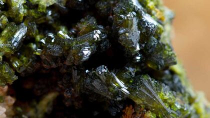 Discover the enchanting world of Green Epidote! Uncover its hidden meanings, fascinating facts, and powerful properties