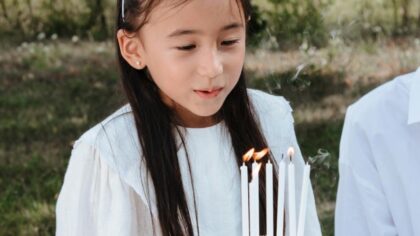 Happy Birthday in Mandarin Girl with her cake